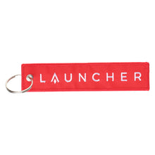 Load image into Gallery viewer, LAUNCHER REMOVE BEFORE FLIGHT KEY CHAIN
